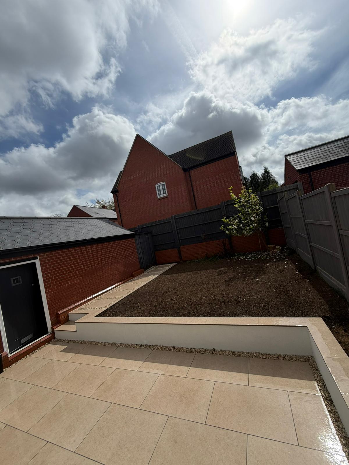 Porcelain patio and raised garden bed